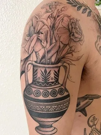 Realistic vase with flowers tattoo Idea