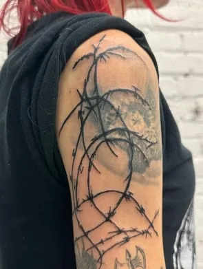 abstract barbed wire tattoo
