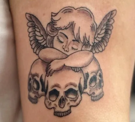 cartoon cherub tattoo