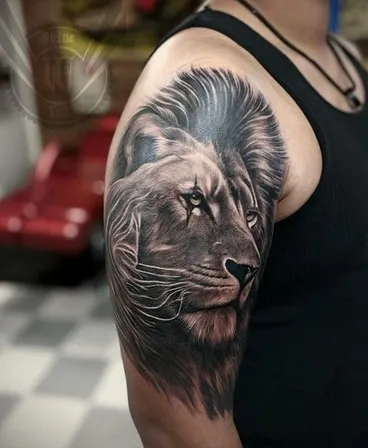 hyper realistic lion tattoo