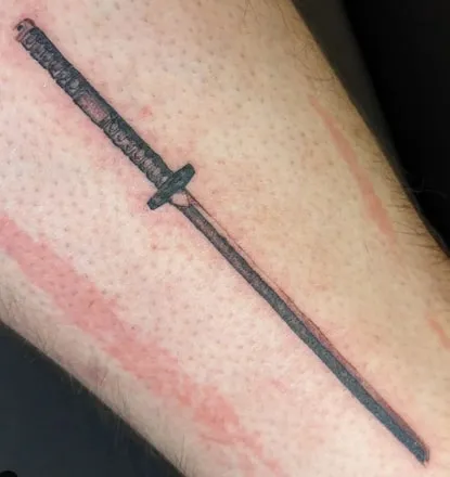 minimal katana tattoo design