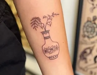 minimal vase with flowers tattoo Idea