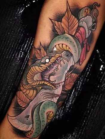 neo traditional knife with a snake tattoo neo traditional knife with a snake tattoo