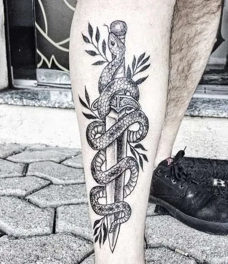 realistic knife with a snake tattoo