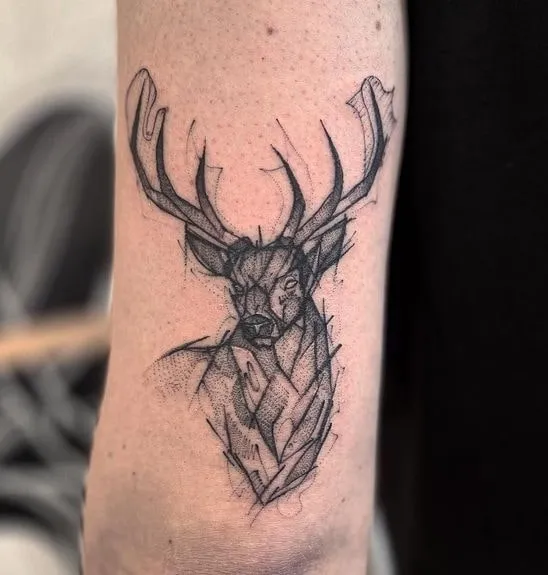 tribal deer tattoo for guys