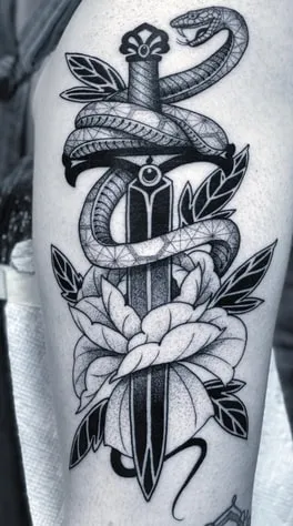 what is the meaning of a knife with a snake tattoo 3 meaning of a knife with a snake tattoo