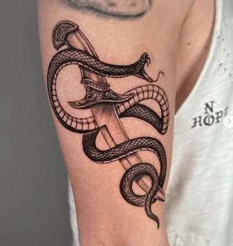 what is the meaning of a knife with a snake tattoo what is the meaning of a knife with a snake tattoo