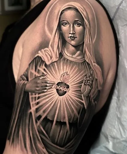 What does a virgin mary tattoo symbolize