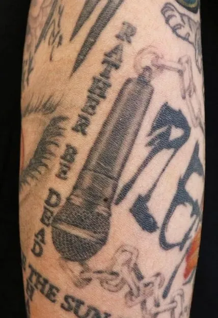 jungkook's microphone tattoo