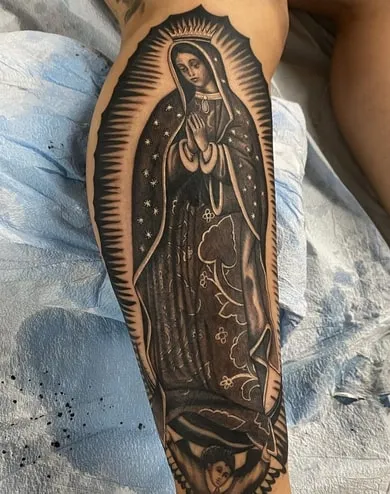calf virgin mary tattoo design