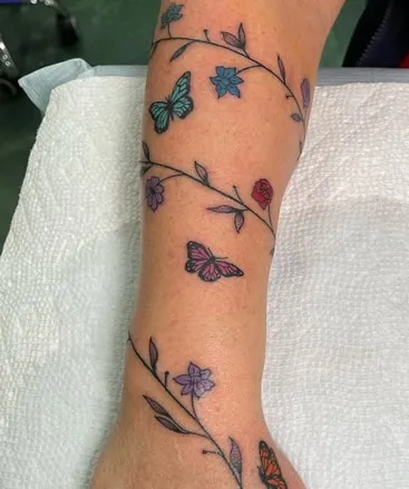 butterfly vine tattoo