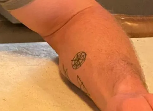 dharma wheel tattoo chris hemsworth