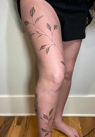 vine leg tattoo