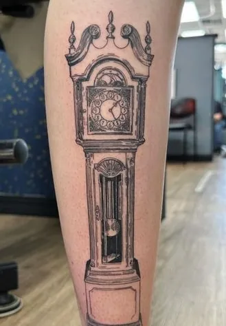 grandfather clock tattoo design