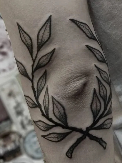 laurel wreath dotwork tattoo