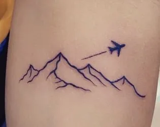minimal mountain tattoo