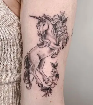 elegant unicorn tattoo