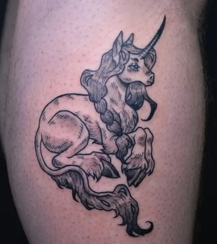 cartoon unicorn tattoo