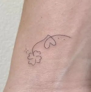 minimal four leaf clover tattoo design 3 minimal four leaf clover tattoo design with heart