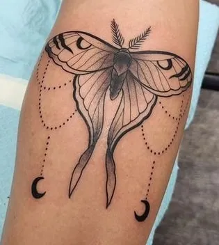 intricate moth tattoo design
