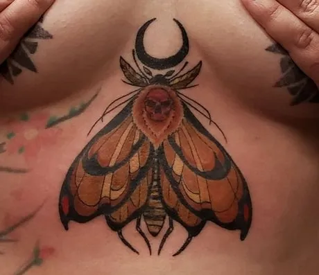 sternum moth tattoo design